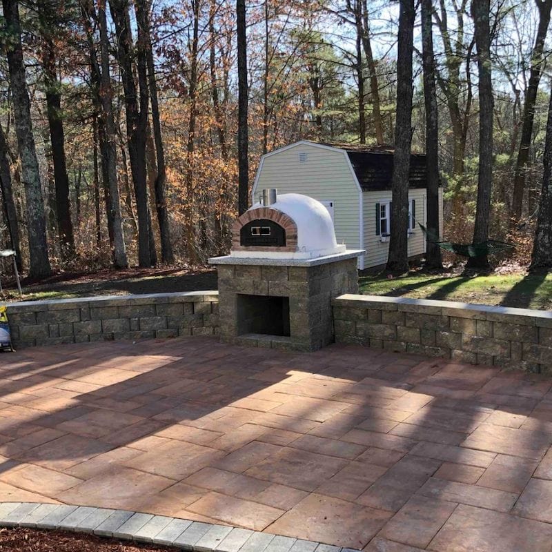 Buena Ventura Sierra Red Arch Brick Oven displayed outdoors