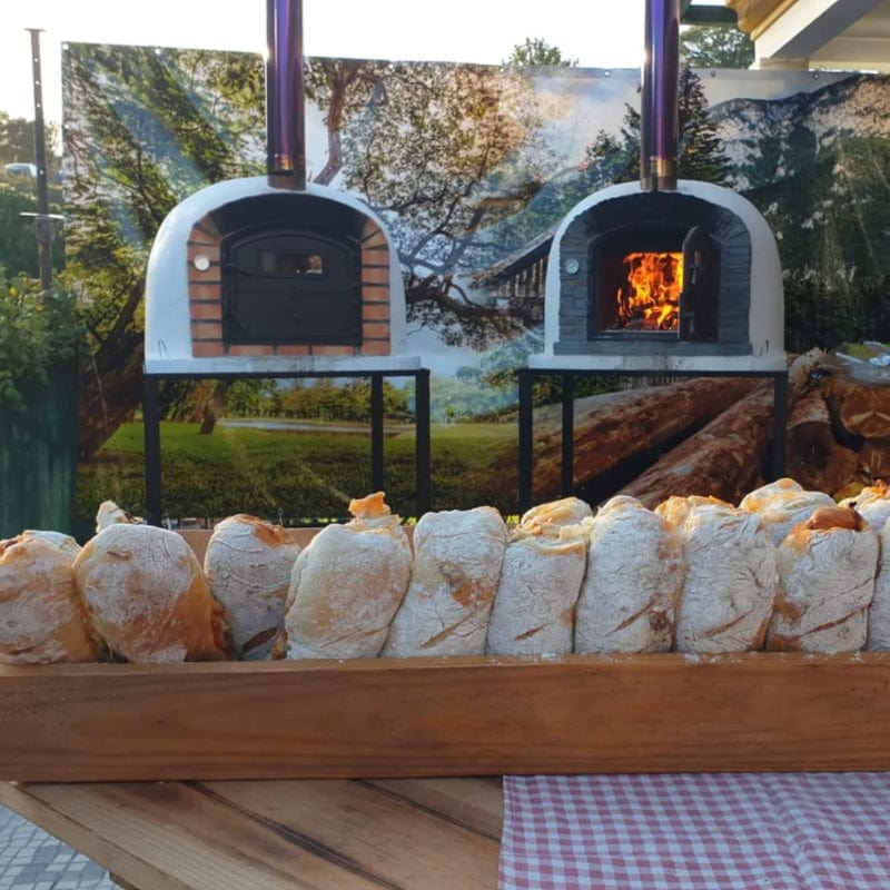 Lisboa Premium Brick Oven next to the Ventura Preto Black Arch Pizza Oven