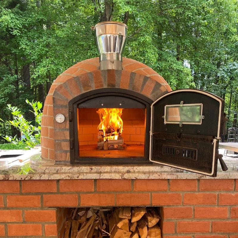 Pre-heating the Lisboa Rustic Brick Finish Wood Fired Pizza oven