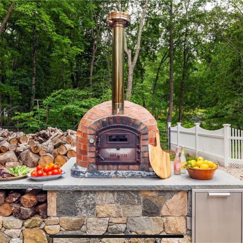 Lisboa Rustic Brick Finish Premium Pizza on an outdoor kitchen countertop