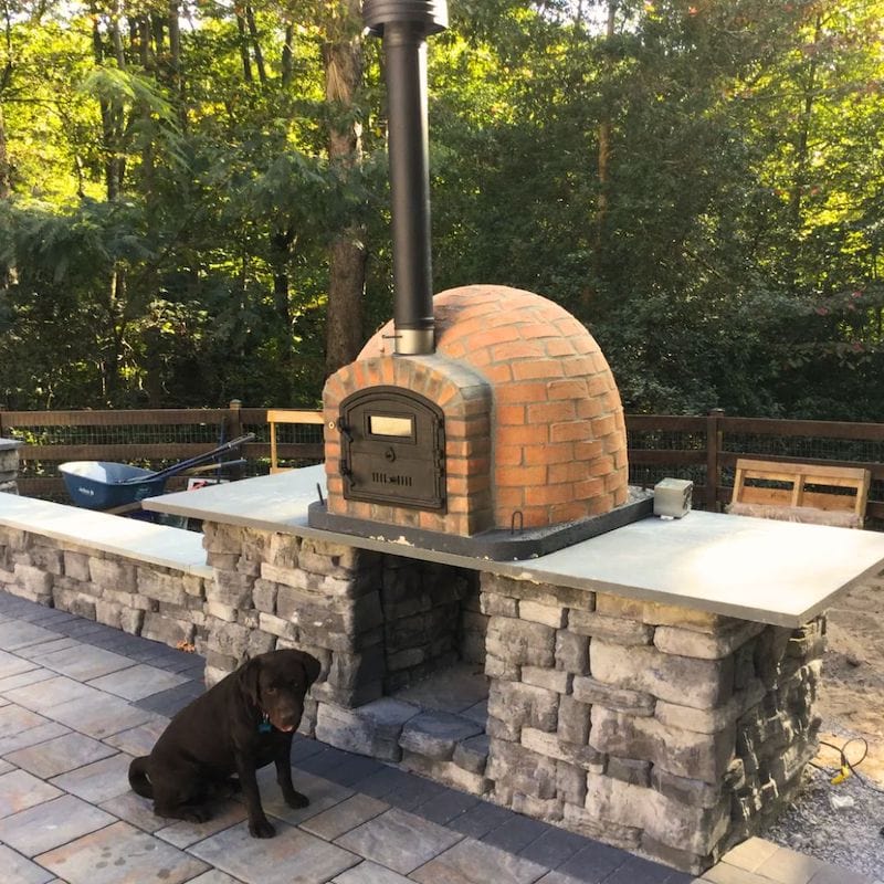 Lisboa Rustic Brick Finish Premium Pizza on an outdoor kitchen countertop