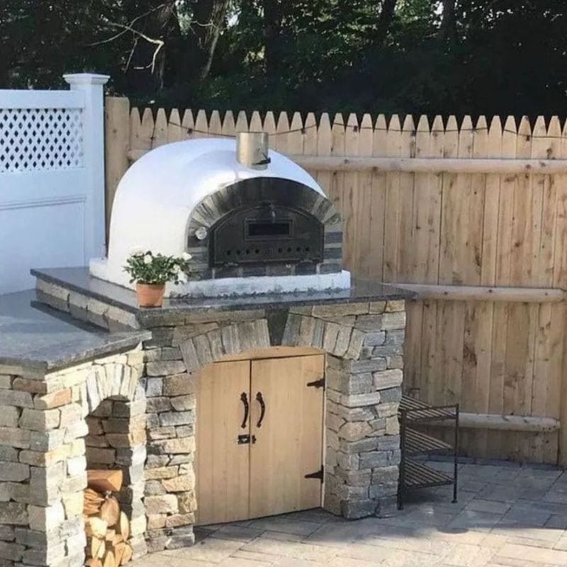 Stone Face Pizzaioli Brick Oven on an outdoor kitchen countertop