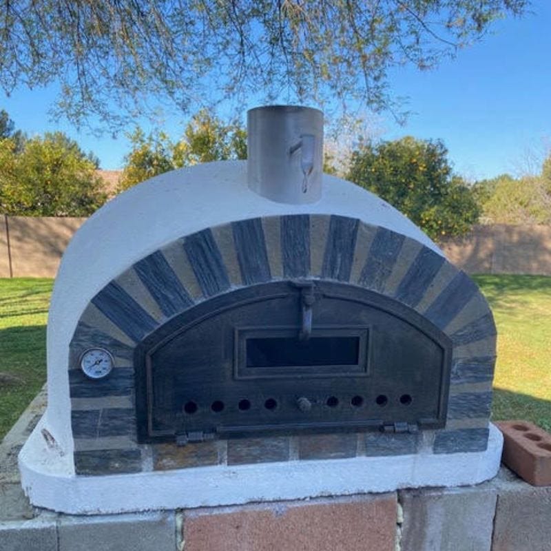 Pizzaioli Premium Wood Fired Oven under natural lighting