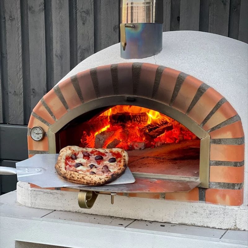 Cooking Pizza in the Traditional Pizzaioli Brick Pizza Oven